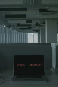 Laptop showing a cyber security message