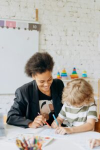 Decorative image of teacher with pupil to demonstrate effective safeguarding practices